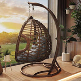 Porch swing with tropical ivory and auburn hydrophobic framed pads, metal stand and chain included